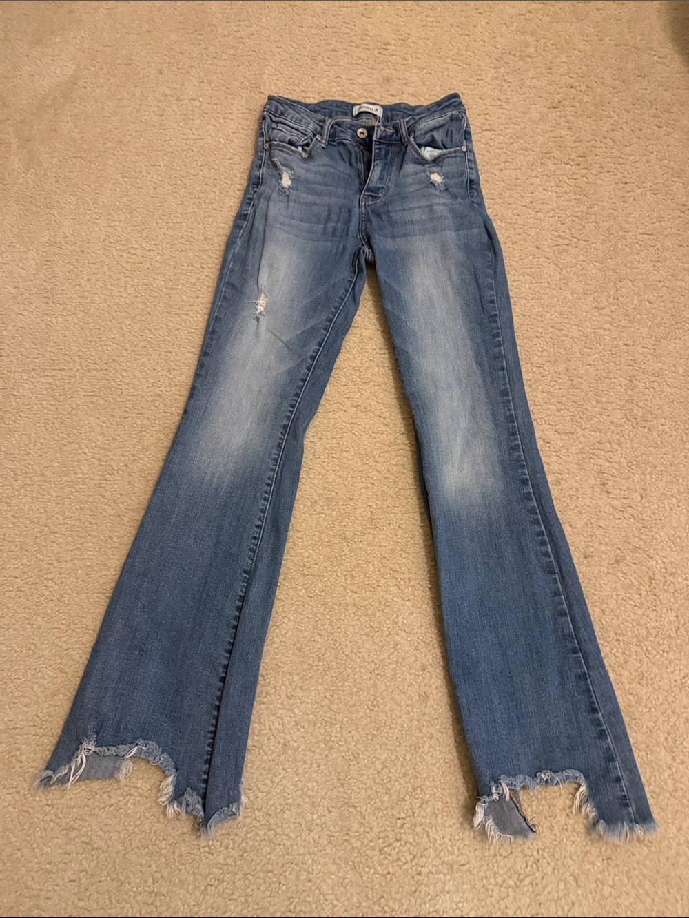Women’s Light Blue Distressed Flare Jeans with Frayed Hem